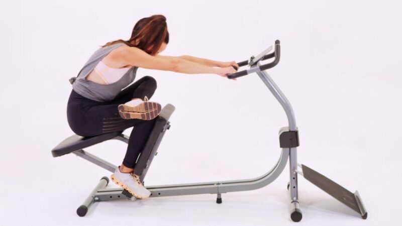 A Woman Using a Stretching Machine for Full-Body Relief