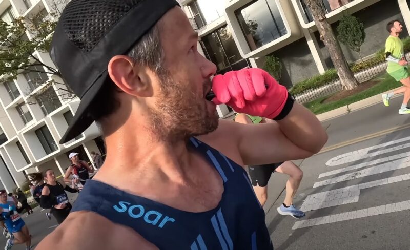 Runner eats candy bar during the race