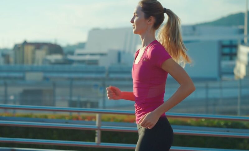 Woman running in the city