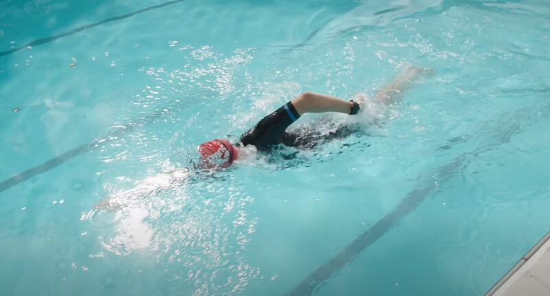 Guy swimming in the pool