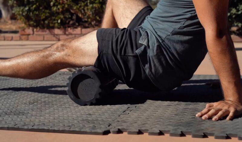 Man using foam roller