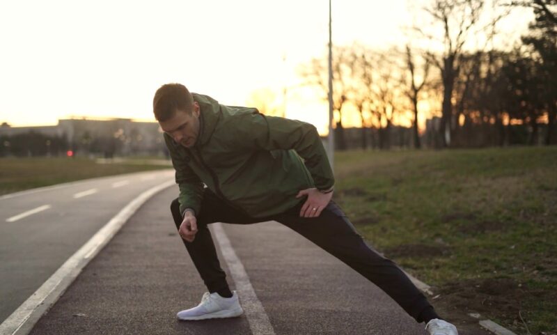 Runner warming up in early morning