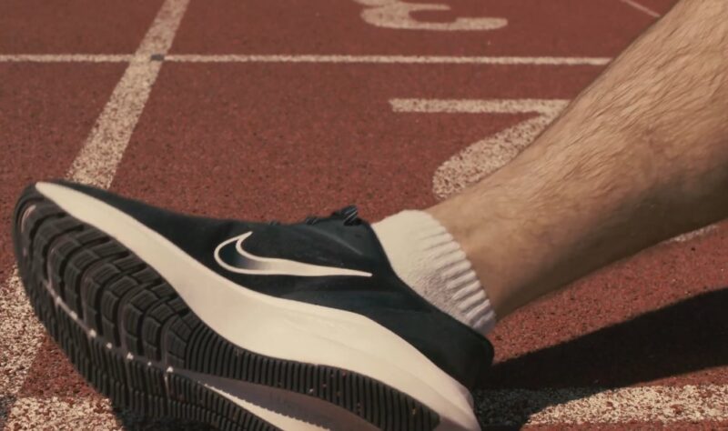 Runner resting his legs after a workout