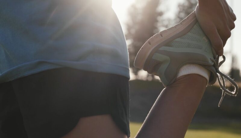 Runner stretching after workout