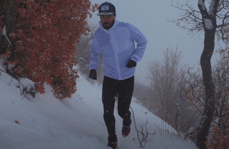 Runner training on a snowy winter day