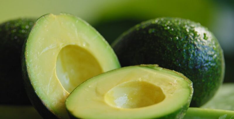 Freshly cut avocados, glistening with moisture