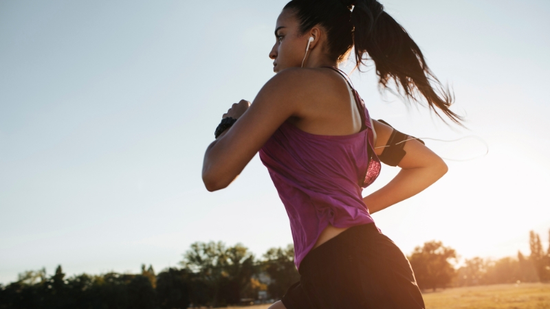 A Person Running Outdoors, Following Tips on How to Start Running when You're out Of Shape