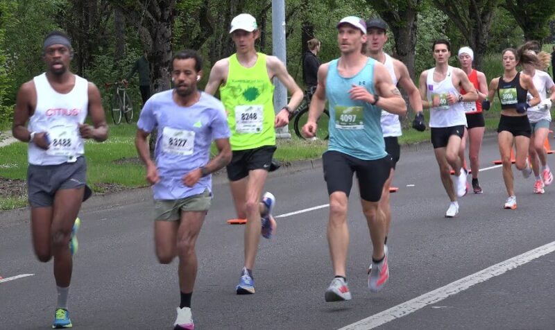 A sea of determined runners during a marathon