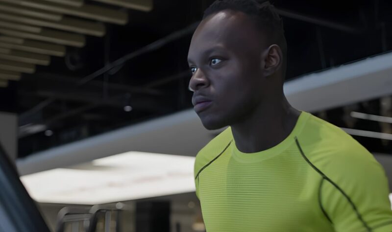Man intensely focused on his workout