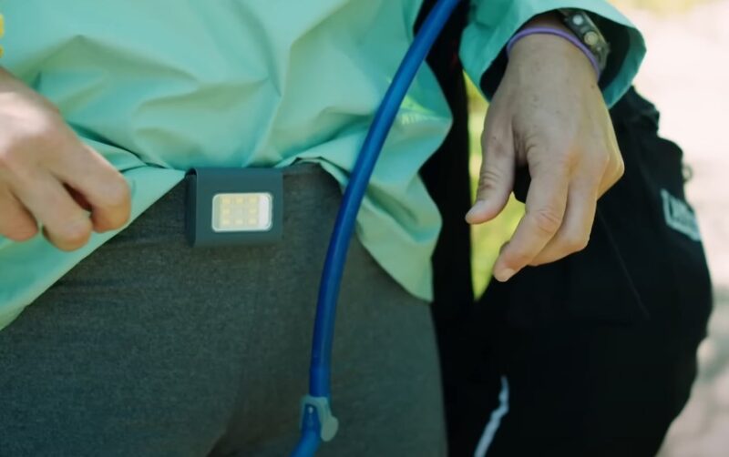 Woman adjusting waist pack for running