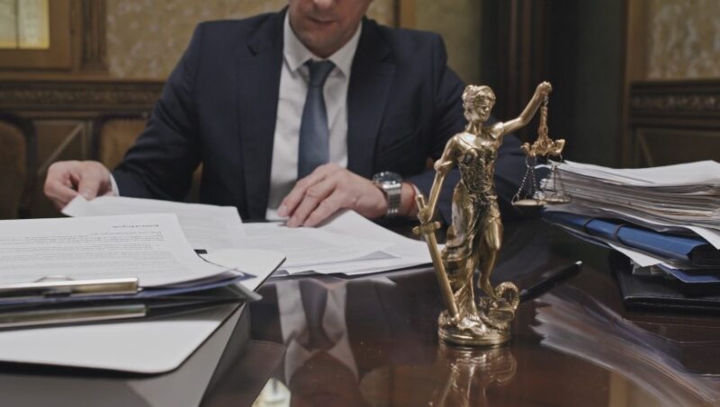 A lawyer reviews legal documents