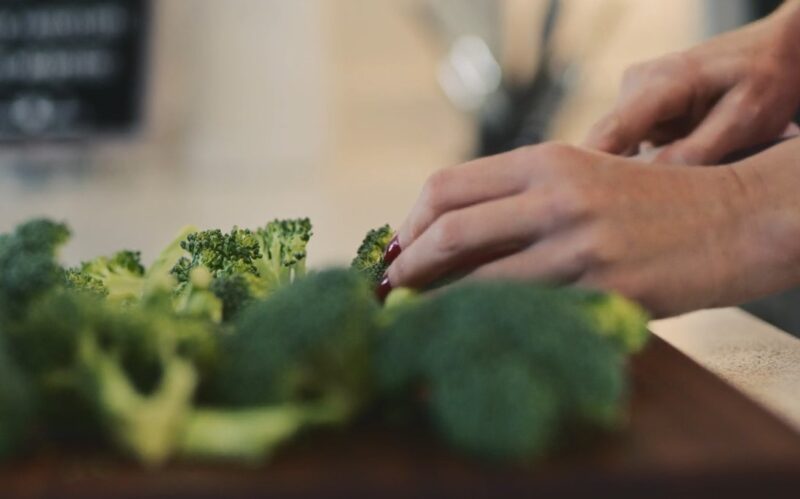 Fresh broccoli florets are meticulously separated