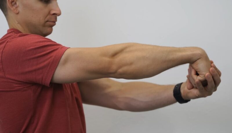 Elbow extension stretch, focusing on proper form