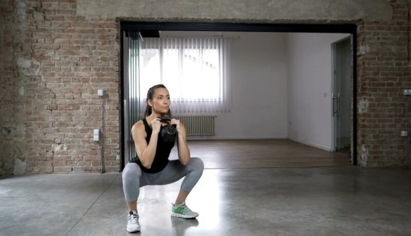 Woman doing goblet squats