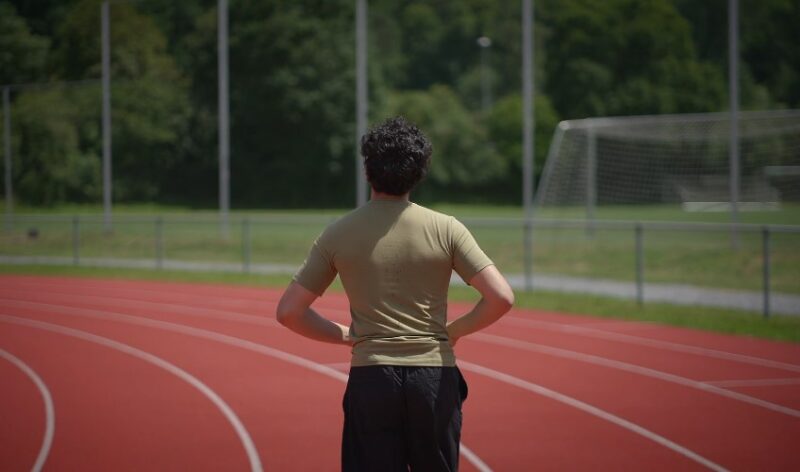 A runner practicing on a track